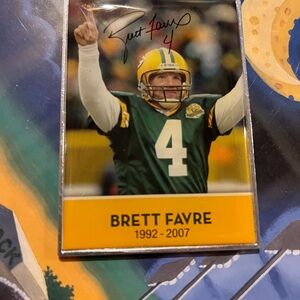 Green and Yellow Sports Memorabilia Card. Signed Favre card